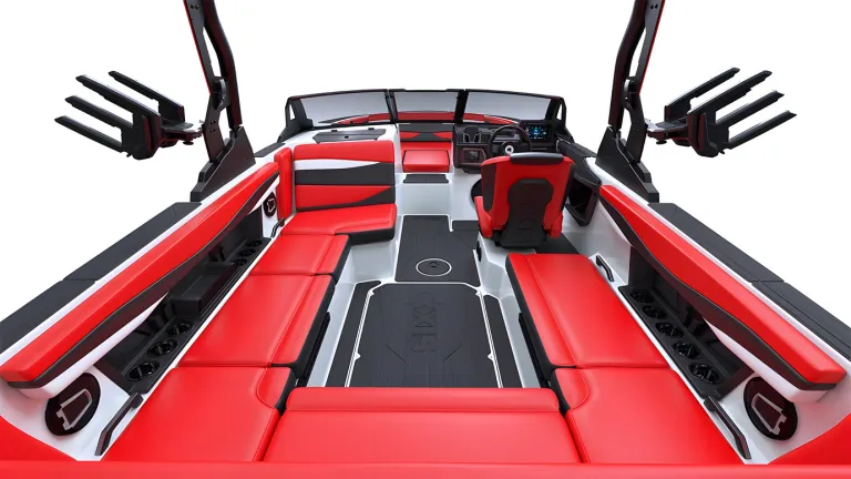 Studio render of the red-and-black cockpit of an Axis A225, wraparound seating and helm shown on a white background.