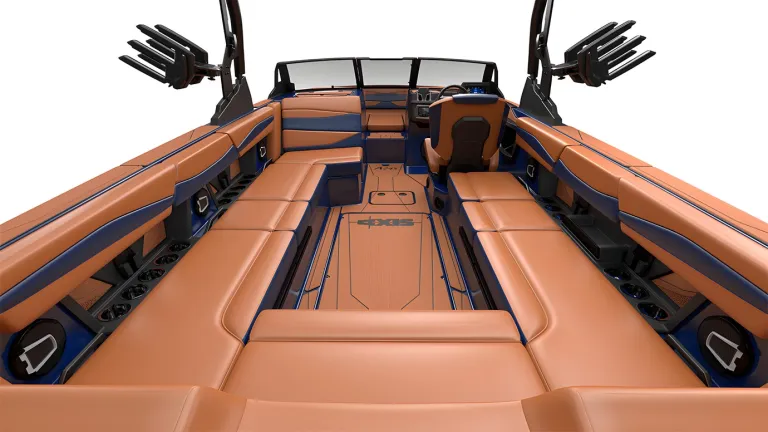 Studio render of the tan-and-navy cockpit of an Axis A245, wraparound bow seating and helm on a white background.