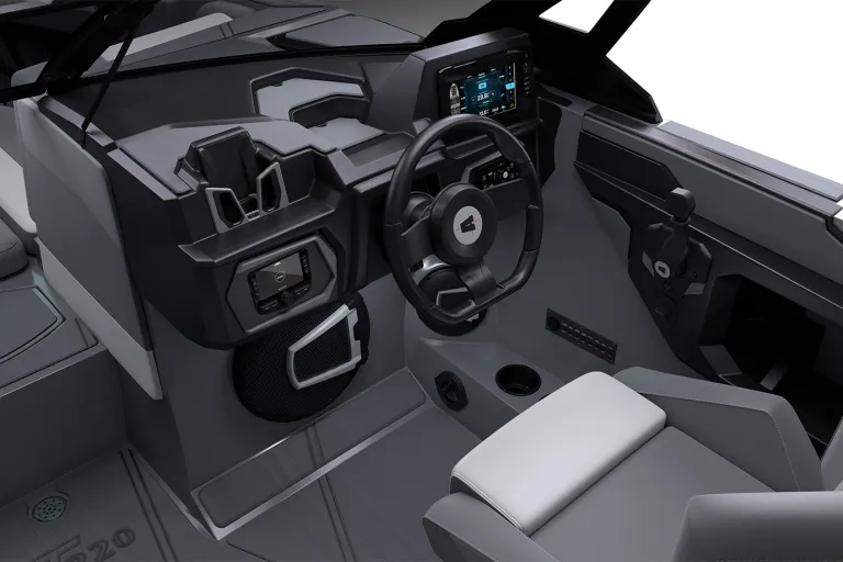 Wide studio render of the full gray-and-white cockpit of an Axis T220 wake boat, wraparound seating, helm and tower speakers viewed from the rear on a white background.