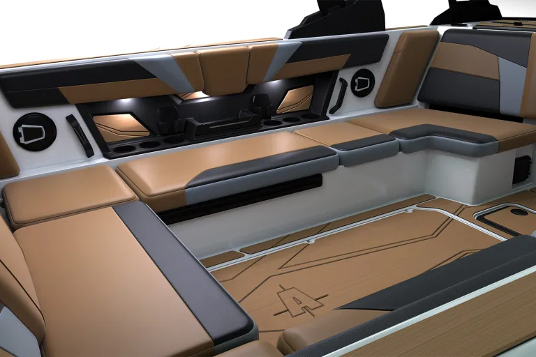 Studio render of the rear transom seating in an Axis T235 — tan-and-white cushions with tower speakers, cupholders and open center storage — the Axis logo on the teak-look floor, on a white background.